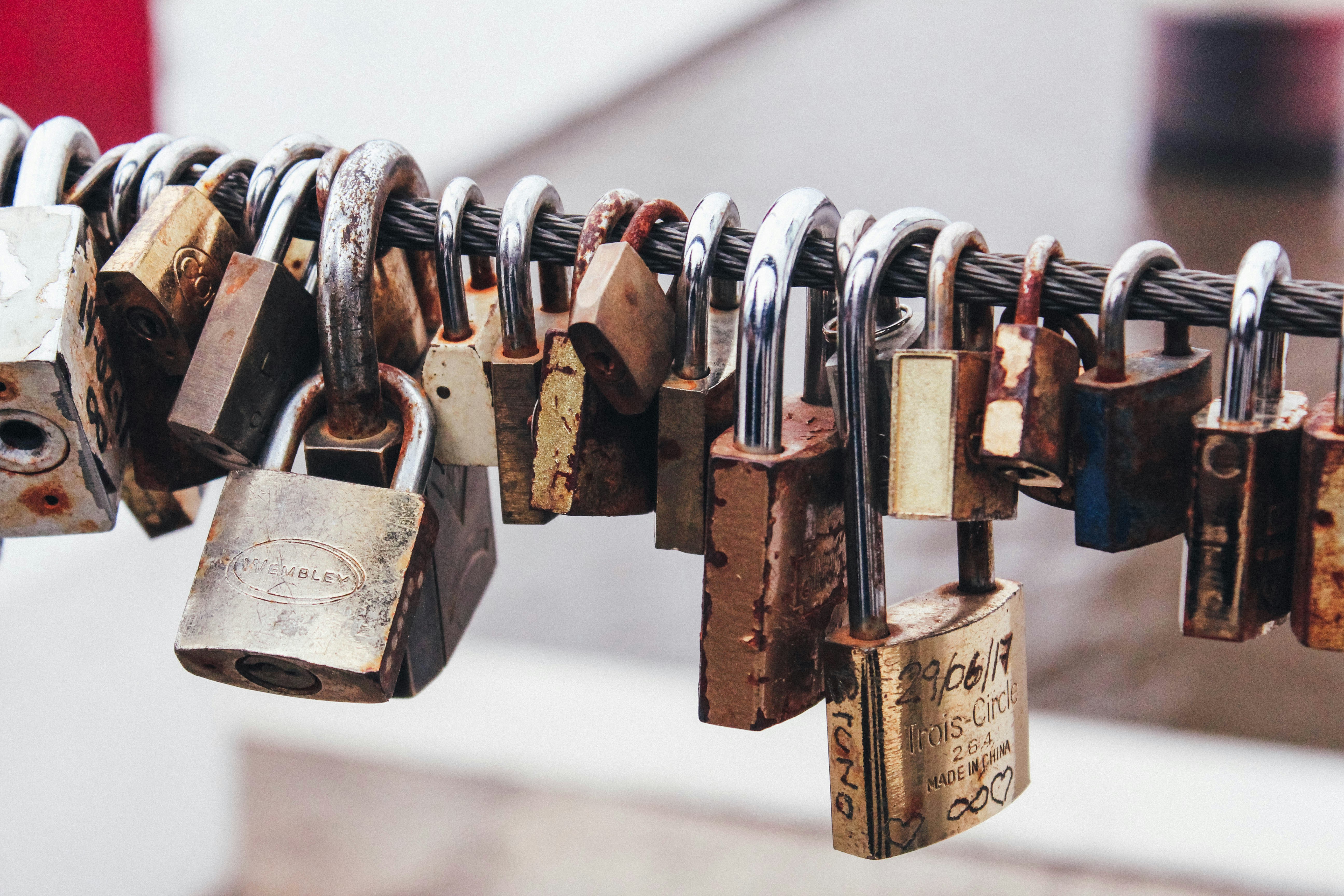 padlocks on a chain fence